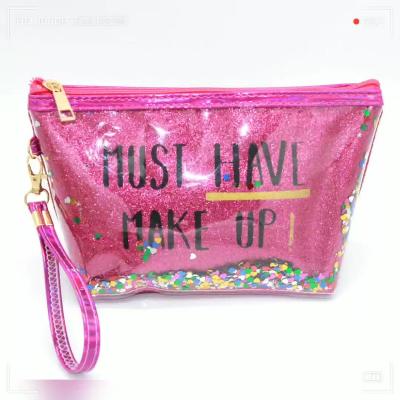 China 2022 Wholesale ODM High Quality AIZHU Korean Letter Printing Laser Cosmetic Bag Sequin Splicing PVC Quicksand Cosmetic Bag Can Be Set Logo for sale