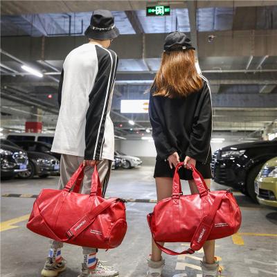 China Large-capacity Korean version of the trend travel bag PU business handbag large-capacity shorts distance fleece gym for sale