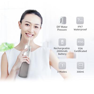 China 2000mAh água portátil recarregável Flosser 140PSI IPX7 impermeável à venda