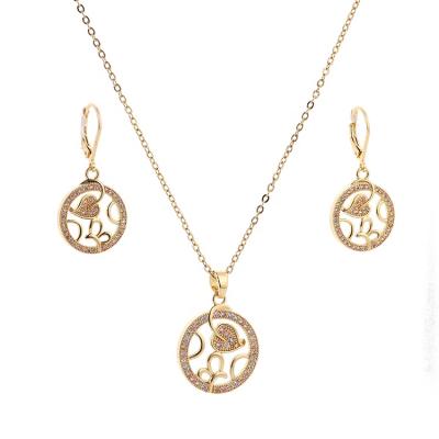 China Romantic Designer Round Hollow Out Gold Plated Zircon Necklace And Earrings Jewelry Set For Women for sale