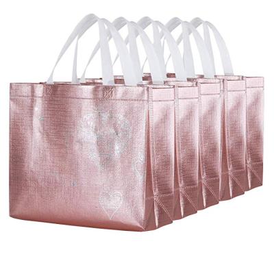 China Medium Reusable Nonwoven Handled Shiny Durable Gift Bag Shopping Bag Nonwoven Promotional Bag for sale