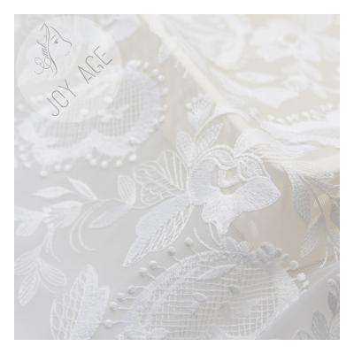 China Breathable High Quality French Tulle 3D Embroidery Lace Fabric And Low Price Bridal Lace Fabric For Wedding for sale