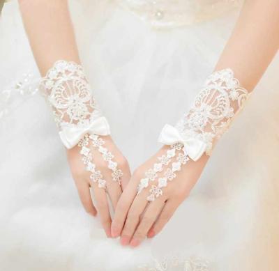 China Fingerless Lace Wedding Ivory Red White Short Wrist Length Viscose/Polyester Gloves Appliques Sequins Bridal Gloves for sale