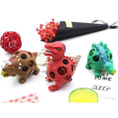 China Squeeze Toy QX46 Mesh Dinosaur Squeeze Ball Dinosaur Stress Relief TPR Duct Toys Dinosaur Squishy Toy for sale