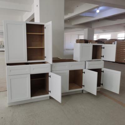 China Solid Wood Wooden Shaker Cabinets White Kitchen Cabinets Factory Designs for sale