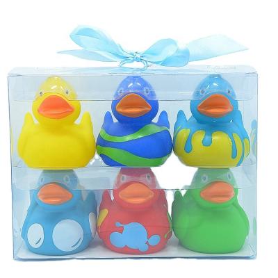 China Used For Entertainment Free Sample Wholesale Squeeze Promotional Floating Customize Rubber Duck Bath Toy Set for sale