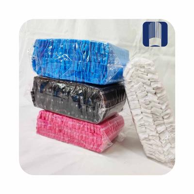 China Cheap modern hotel hair net making machine 18 inch thick single rib hair net nonwoven headwear for sale