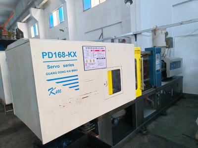 China Kleine benutzte Plastikspritzgussmaschine Kaiming PD168-KX mit ursprünglichem Sevor-Motor zu verkaufen