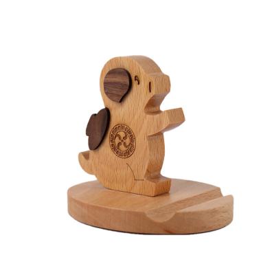 China Mini Lazy Shape Adjustable High Quality Wooden Animal Smartphone Mobile Phone Holder for sale