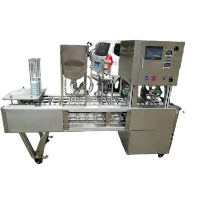 China Beverage Pre Cut Lid Cup Filling Sealing Machine BG-2 for sale