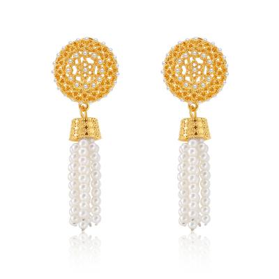 China Vintage Fancy Design Brazil Hollow Out Flower Pearl Long Tassel Gold Plated Earrings for sale