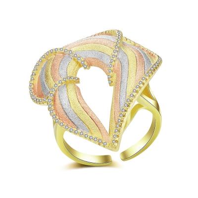 China Newest Valentine's Day Gift Hollow Three-tone Jewelry Heart Shaped Rings for sale