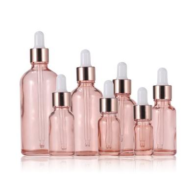 Cina Bottiglie di olio essenziale vuote 10ml 20ml 30ml 50ml 100ml Bottiglia gocciolante in vetro oro rosa in vendita