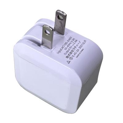 China Dual USB Socket Mobile Phone Charger 5v2.4A Mobile Phone Power Adapter Folding Smart Plug Fast Charging USB Charging Head for sale