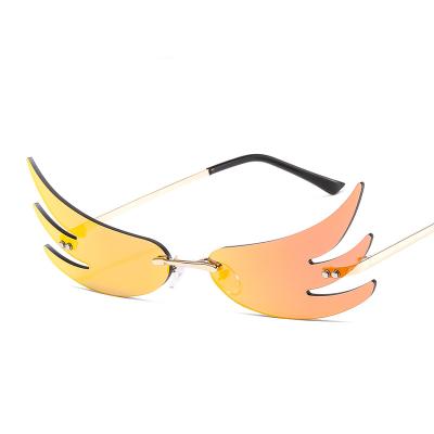 China Fashion Sunglasses Newcomers High Fashion Luxury Fashionable Unique Fire Wholesale Shaped Rimless Sun Glasses Party Women Men Shades Sunglasses for sale