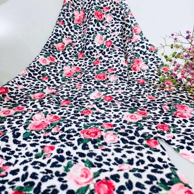 China Brown Leopard and Pink Anti-Static Ball Fabric Digital Printed Bullet Knit Fabric for Garment and Dresses for sale