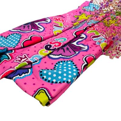 China Shrink-Resistant Bow Fabric 100% Polyester Colorful Double Brushed Knitting Fabric For Girls Dress for sale