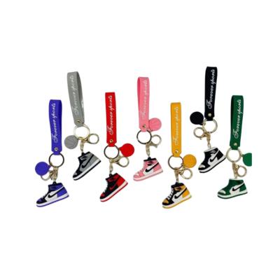 China Souvenir gifts promotion in 2d/3d running cartoon silicone pvc soft key chain sports rubber key chain for sale for sale