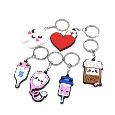 China Souvenir Gifts Promotion Custom Logo Designer Manufacturers PVC Rubber Cute Cartoon Key Chain Custom Made Supplies for sale