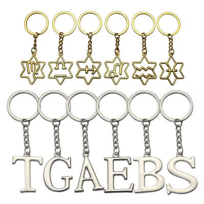 China Souvenir Gifts Luxury Promotion Ring Accessories Color Custom Show Customize Fashion Letter Words Logos Key Chain for sale