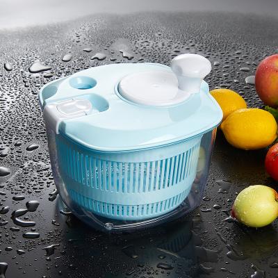 China Sustainable Portable Vegetable Dryer Vegetable Salad Processor Spinner With Slicer Grater Cleaver for sale