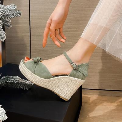 China Fashion Trend Summer New Design One Line Buckle Around Open Toe High Heels Thick Sole Women Wedge Sandals With Bowknot for sale