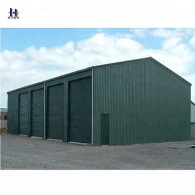 China Parking Lot China Low Cost Prefab Small Warehouse Design With Steel Structure Frame for sale