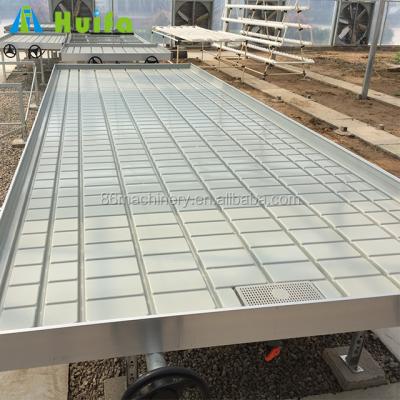 China UV Protective Capabilities Growing Tables For Commercial Greenhouse Bench Qualified Roll Backflow Seeding System for sale