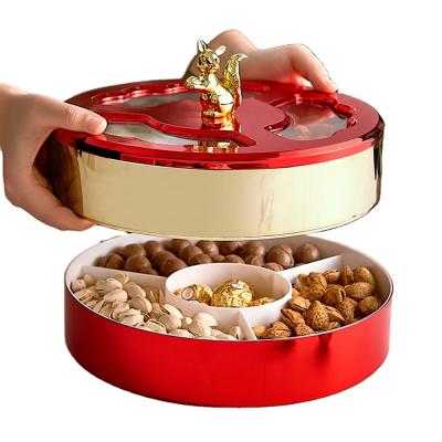 China Exquisite sustainable plastic candy box alloy double layer nut dish rotating fruit snack storage box for sale