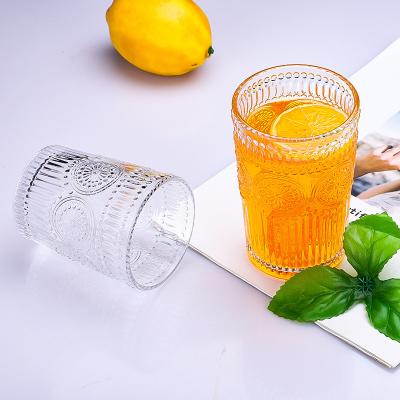 China New style household products reusable glass cup sunflawer glass water drink glass water bottle for sale