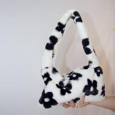 China Handbag 2020 Faux Fur Shoulder Bag Women Plush Zebra Print Shoulder Bag Fashion New Retro Flower Armpit Cute Winter Christmas Bag for sale