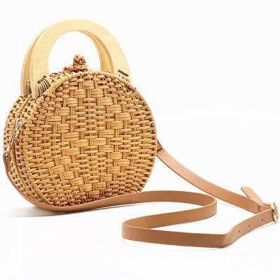 China Fashion Wooden Handle Rattan Woven Bag New Camel Color Straw Woven Bag Single Shoulder Messenger Bag for sale