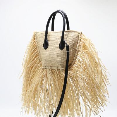 China Fashion New Elegant Women Lady Long Tassels Natural Raffia Straw Bag for Thailand Resort Dress Straw Bags for sale