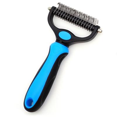 China Pet Grooming Brush Tool Stocked Double Sided Shedding And Dematting Undercoat Rake Comb For Pet for sale