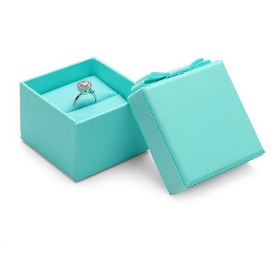 China China factory square plastic paper box light blue jewelry box with ribbon bow logo custom hot stamping cardboard jewelry box for sale