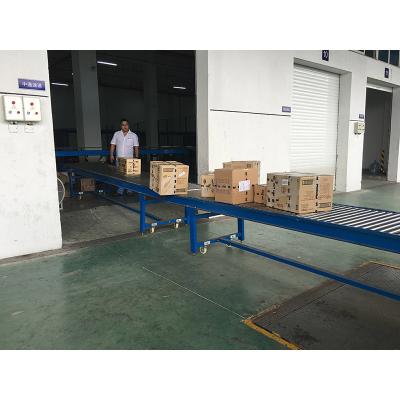 China Warehouse Gravity Fire Resistant Movable High Quality Roller Unloading Conveyor for sale