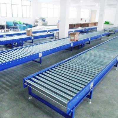 China Heavy Duty Oil Powered Heavy Duty Sprocket Double Roller Conveyor For Pallet for sale