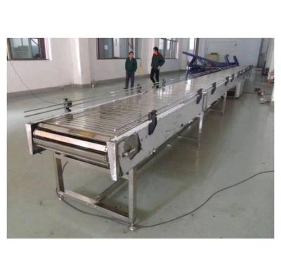 China Garment Shops High Quality Customized Stainless Steel Slat Chain Conveyor Chain Belt Conveyor for sale