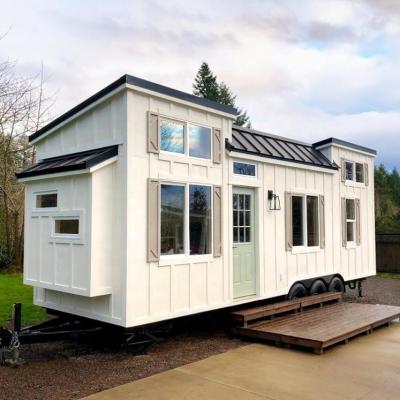 China Modern Prefab Container Trailer House Light Steel Frame Construction Moving Tiny House On Wheels for sale