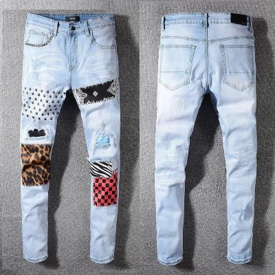 China 2021 new hot sale men's breathable printed patch jeans ripped trousers high street men's jeans for sale