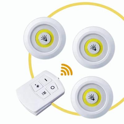 China High Quality COB Wall Mounted LED Puck Light With Remote Control Under Cabinet Light Wireless Tap Push Battery Operated Light for sale