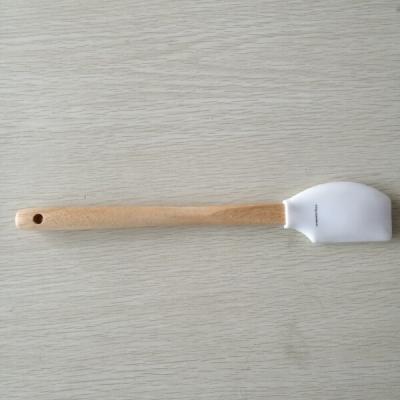 China Viable Novelty Printed Butter Spatula Silicone Scraper With Wooden Handle for sale