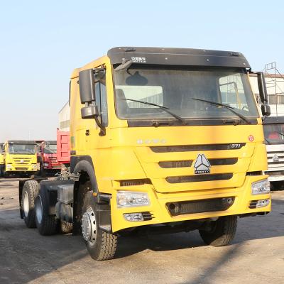 China Used tractor truck head 31-40t used sinotruk howo tractor truck for sale 6800*2496*3100mm for sale