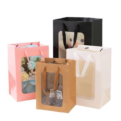 China Wholesale Recyclable Creative Waterproof Transparent Flower Paper Bag Window Christmas Gift PVC Flower Paper Carrier Bag for sale