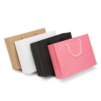 China Wholesale Cheap Price Luxury Famous Brand Gift Custom Recyclable Printed Shopping Paper Bag With Handle With Your Own Logo for sale