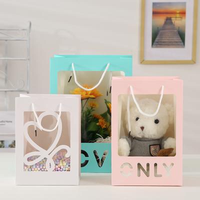 China Cheap Price Custom Made Recyclable Good Selling Open Window Flower Bag Bouquet Packaging Transparent Gift Tote Gift Paper Bag for sale