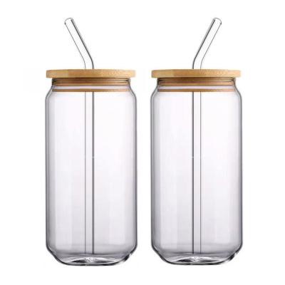 China Sustainable Coffee Accessories Can Shaped 20oz Glass Mugs With Bamboo Lids And Glass Straw for sale