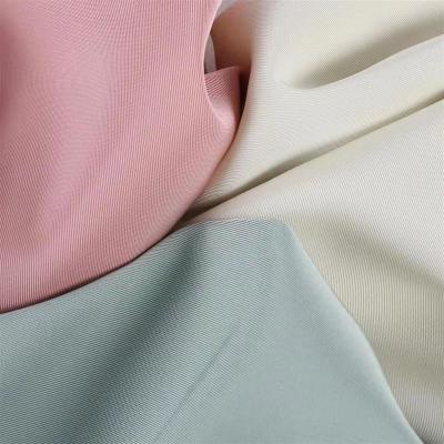 China Memory HuaZu Textile Wholesale Polyester 2063# Acetic Acid Dyed Woven Twill Fabric For Suits Pants for sale