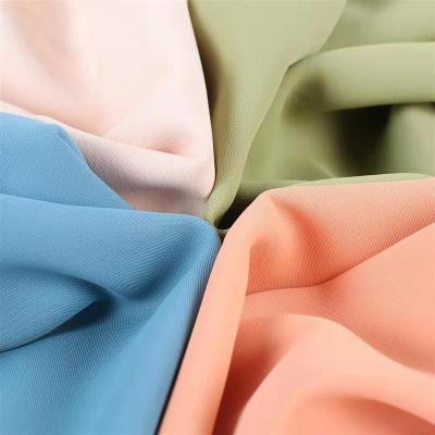 China Wholesale Memory HuaZu Textile Polyester Spandex 2030# Dyed Woven Fabric For Costumes Wind Coat Dress for sale