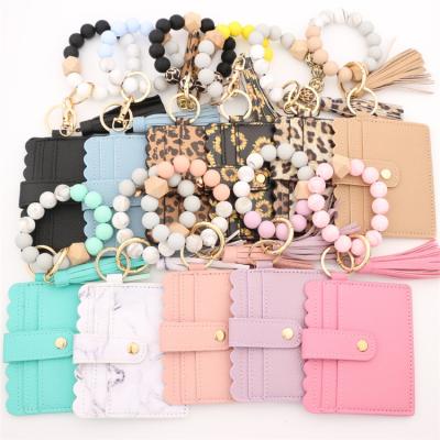 China Bracelets Card Holder Purse With Tassel Beads Key Chain Key Ring Bracelets Card Holder Wristlet Purse With Tassel for sale